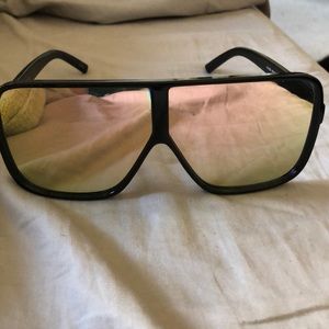 Oversized black and rose gold sunglasses